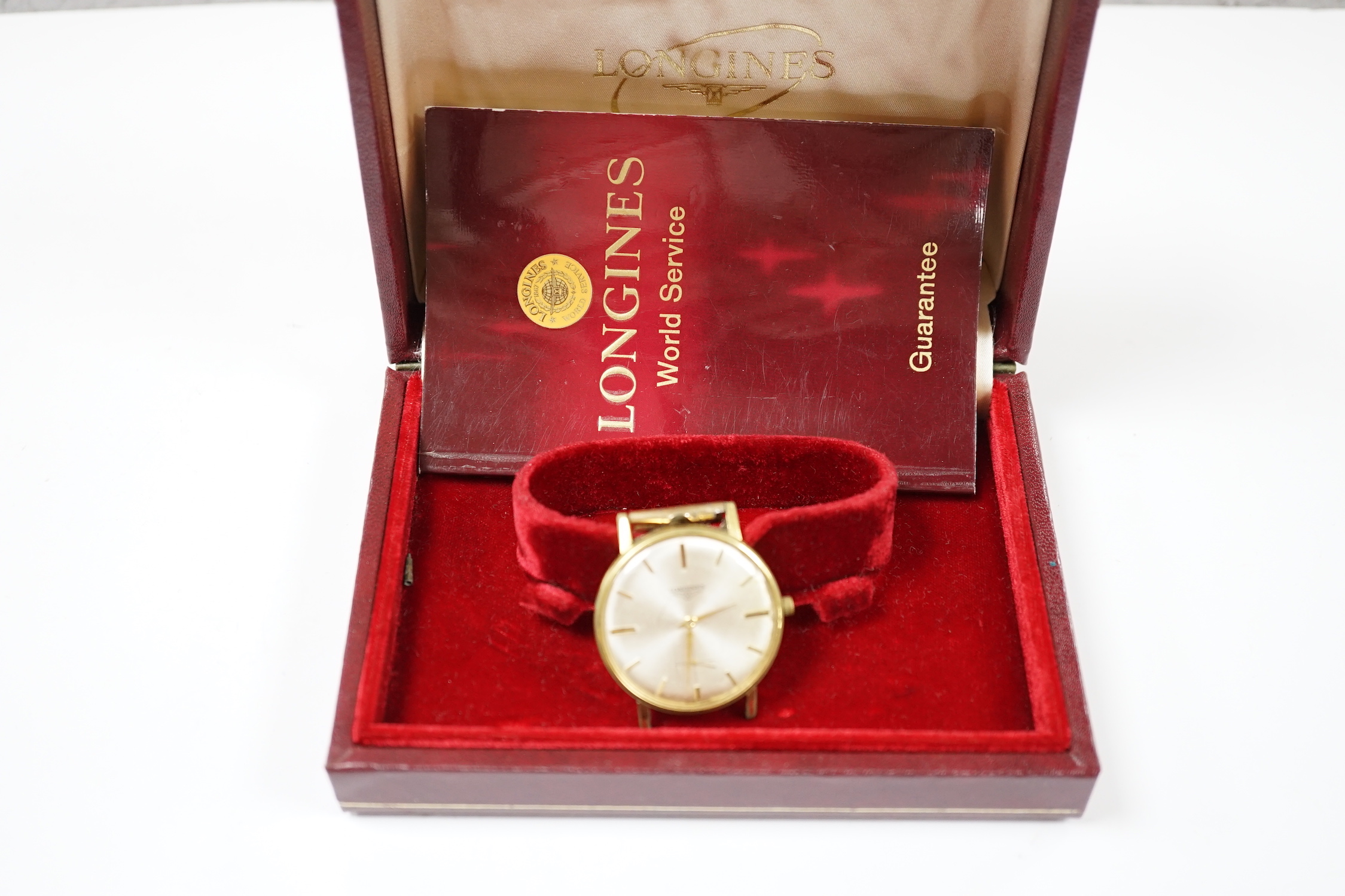 A gentleman's steel and gold plated Longines manual wind wrist watch, with subsidiary seconds, no strap, case diameter 35mm, with box.